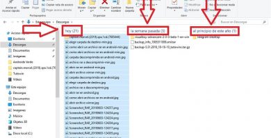 deshabilitar que windows 10 me agrupe las descargas por fechas.